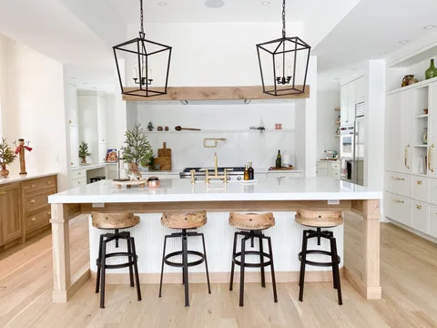 Island front with timber legs and lantern pendants