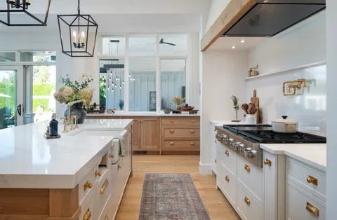 Range wall with a timber beam hood and open shelf