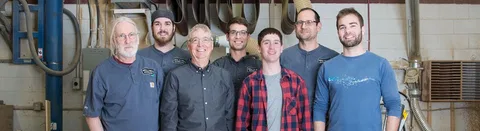 The Wall to Wall crew in the shop